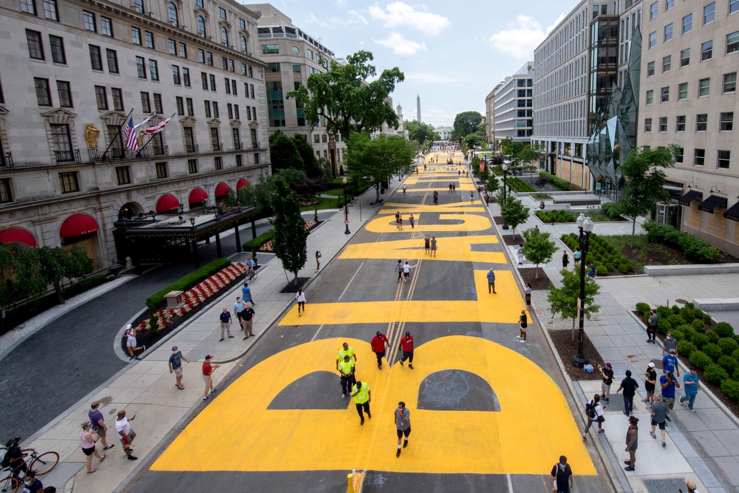 Washington D.C. paints huge Black Lives Matter mural on street leading to the White House
