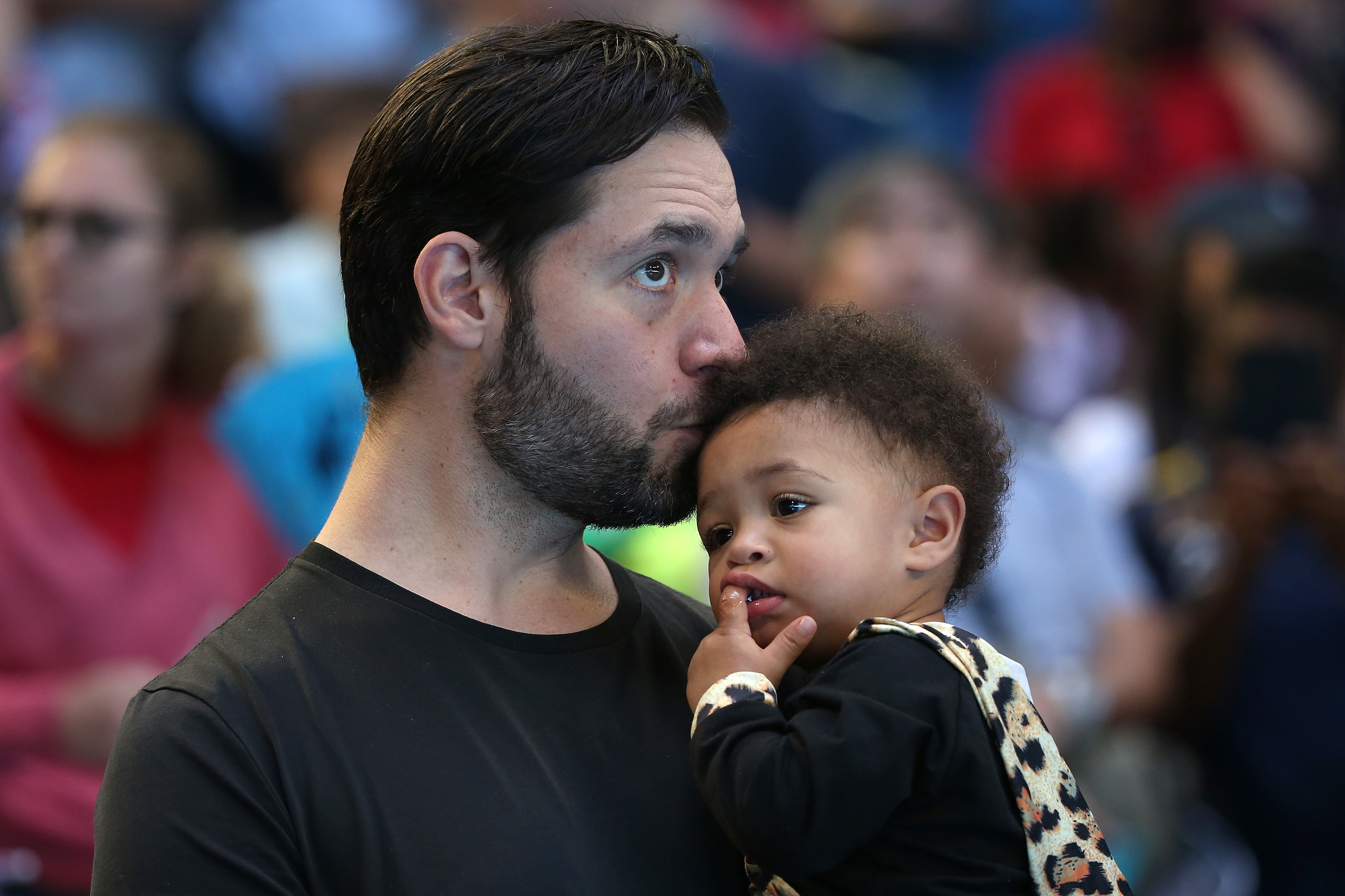 Entrepreneur Alexis Ohanian with his daughter following the women's singles match between his wife Serena Williams and Katie Boulter during the 2019 Hopman Cup at RAC Arena in January 2019 in Perth, Australia.
