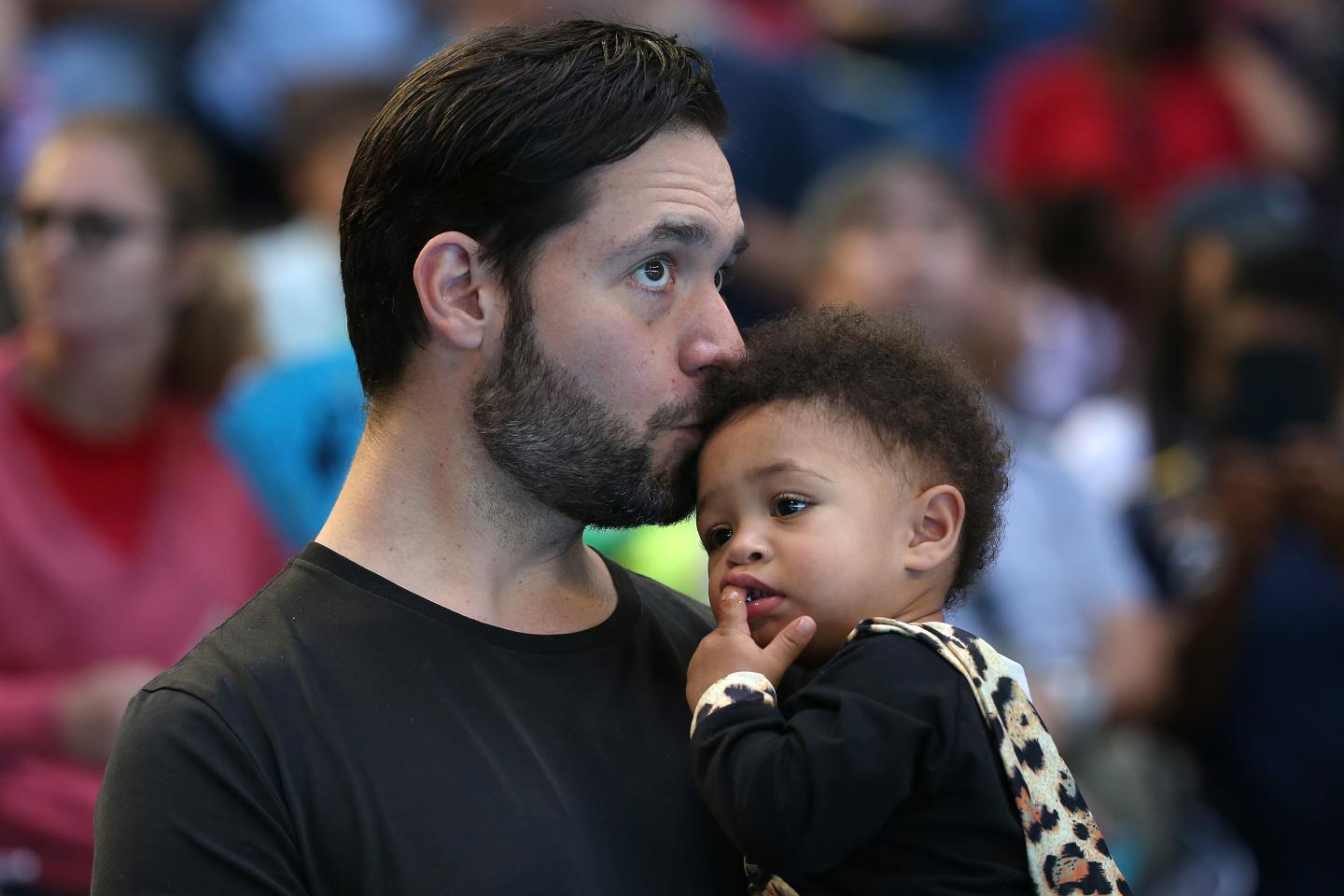 Entrepreneur Alexis Ohanian with his daughter following the women's singles match between his wife Serena Williams and Katie Boulter during the 2019 Hopman Cup at RAC Arena in January 2019 in Perth, Australia.