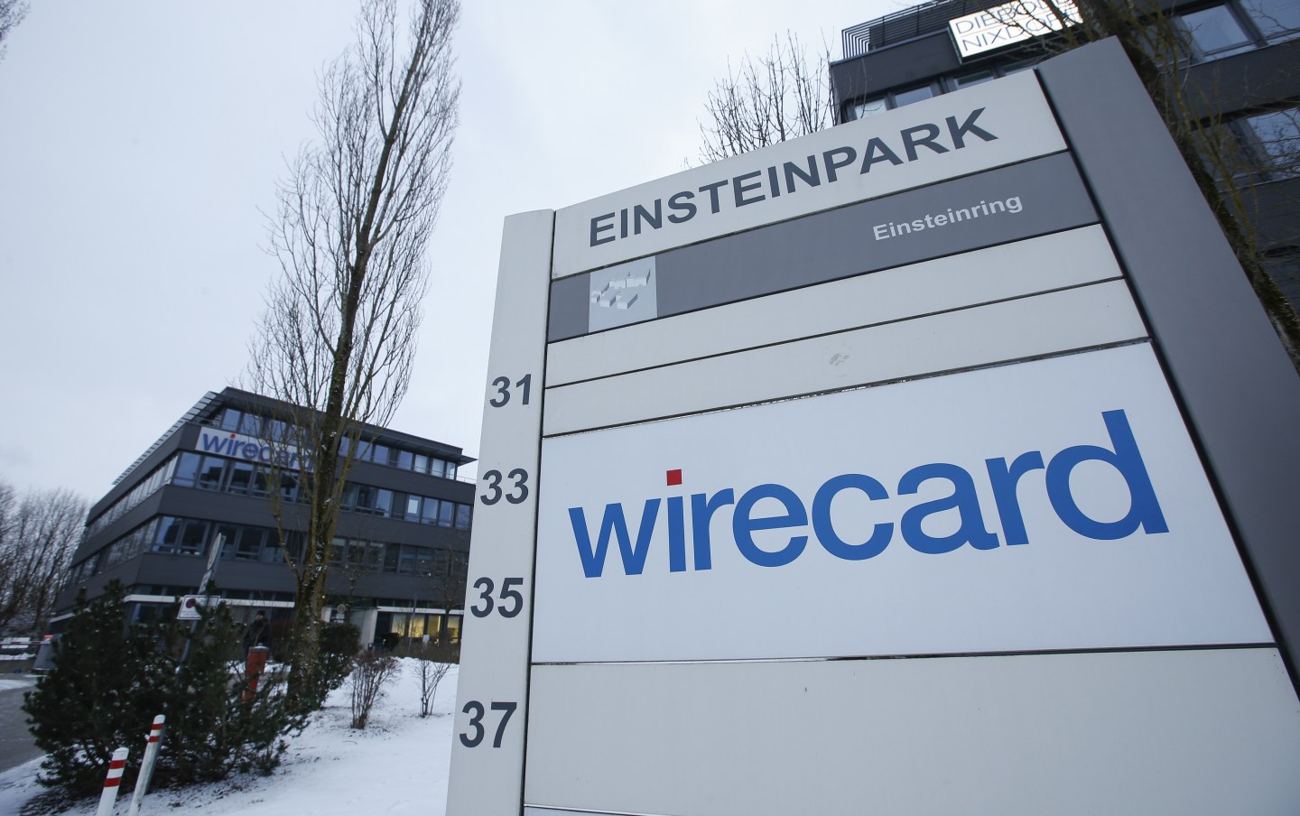 A sign stands outside the Wirecard AG headquarters in the Aschheim district of Munich, Germany. Shares in the once high-flying German fintech tanked for a second straight day as a mysterious $2.1 billion hole in its finances has emerged. Wire photography: Michaela Handrek-Rehle—Bloomberg via Getty Images
