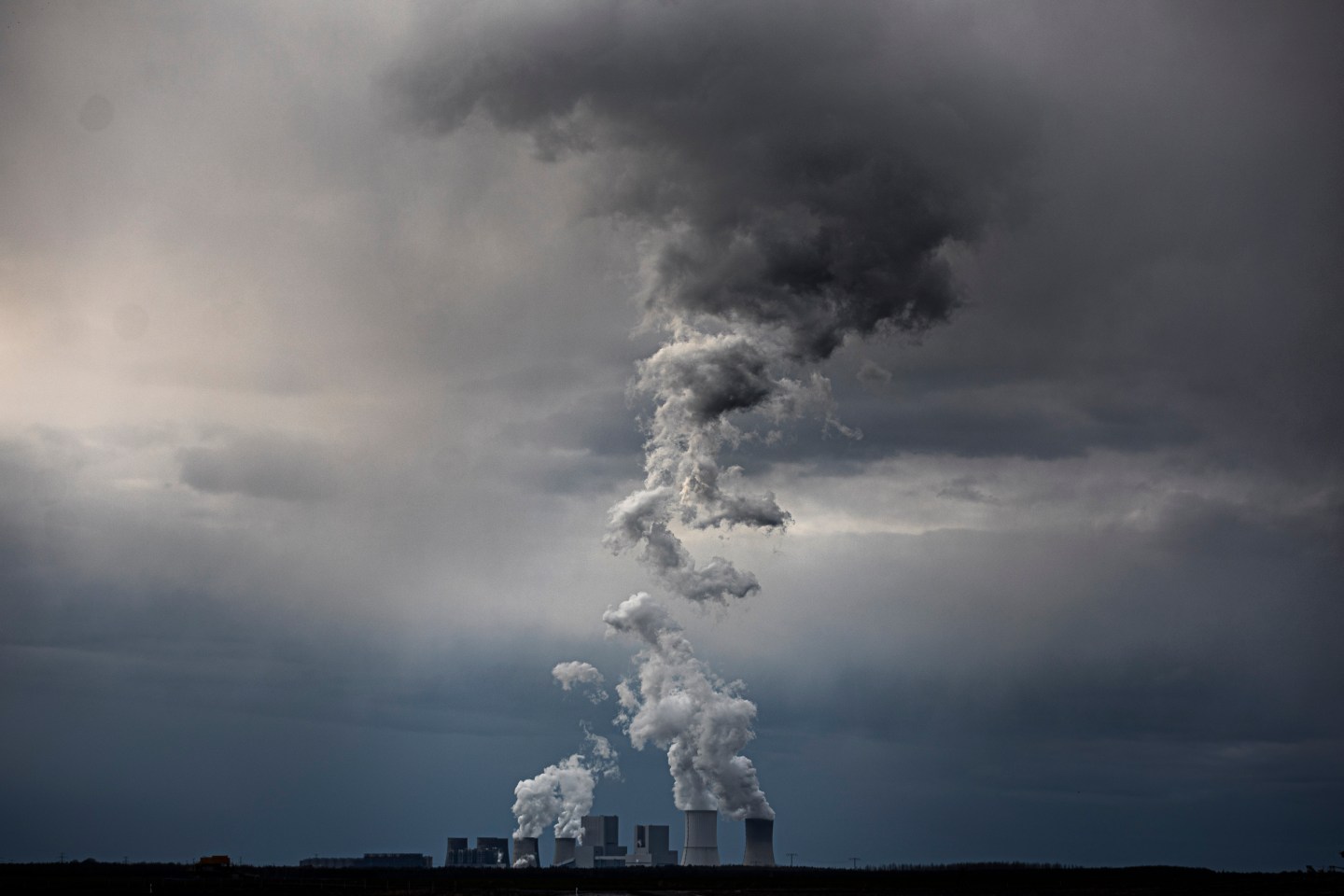 The coal power station of Boxberg in Saxony is pictured in front of dark clouds on March 30, 2020 in Neuliebel, Germany.
