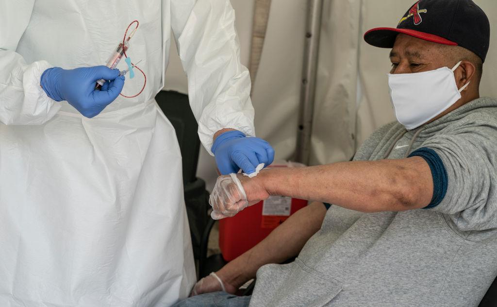 Laboratory technician takes an antibody test for COVID-19 at