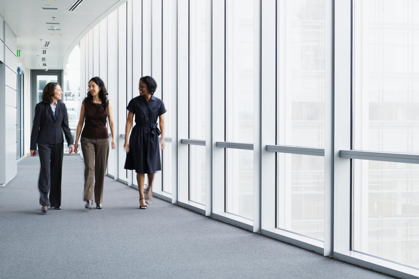 Lawyers walking down a hallway
