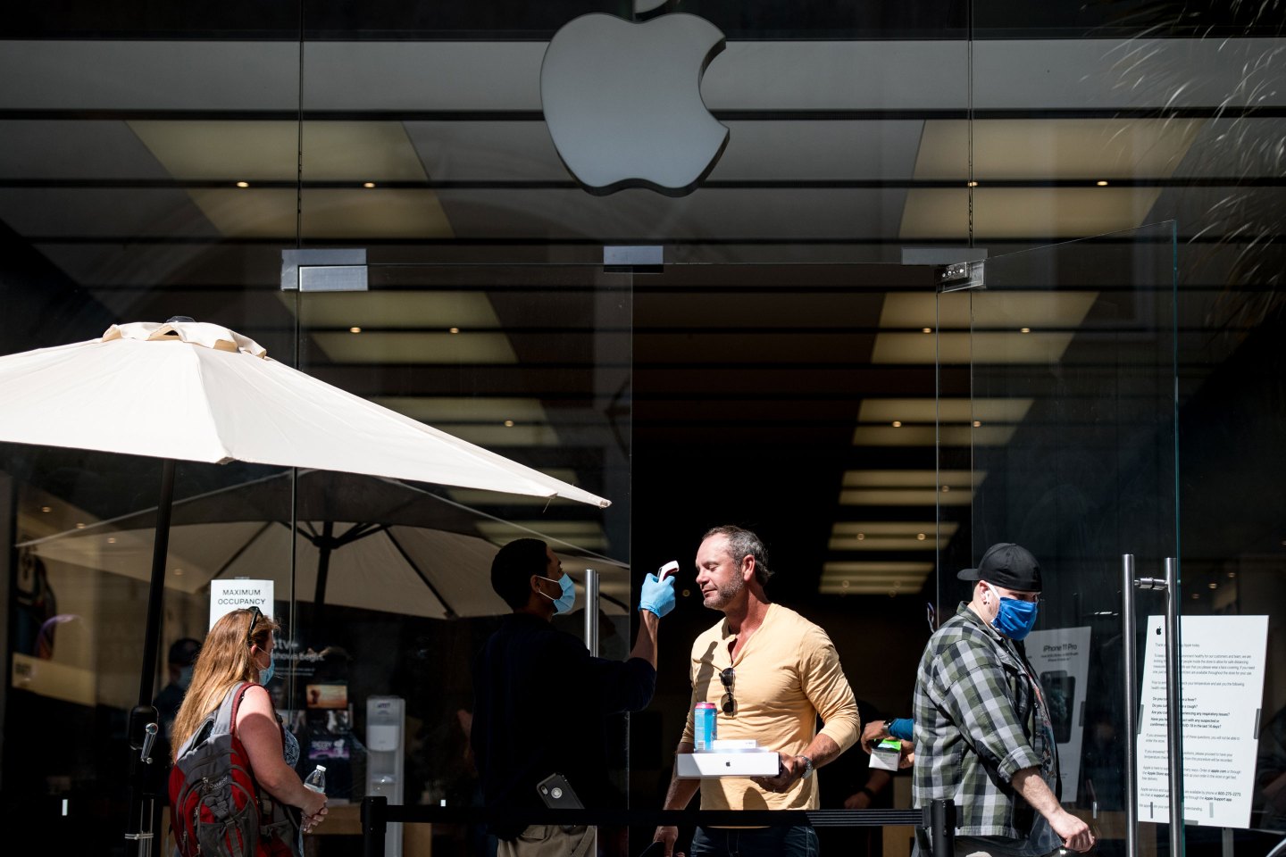 temperature check outside an Apple store