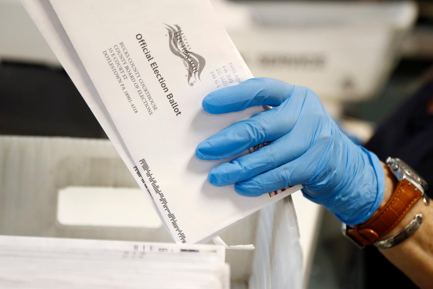 Wealthy donors pour millions into fight over mail-in voting