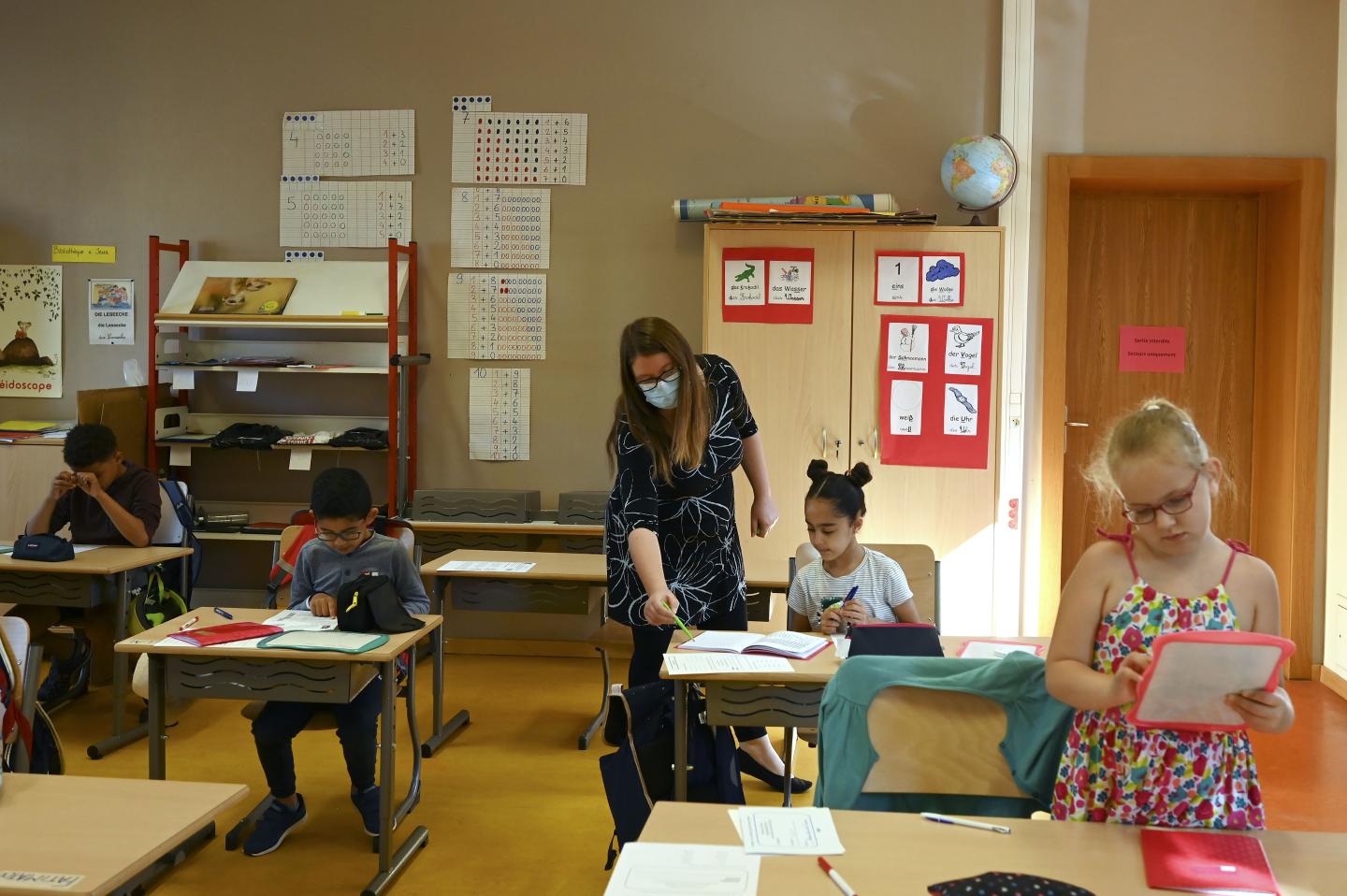 Parents say they need schools to reopen. Teachers aren’t so sure