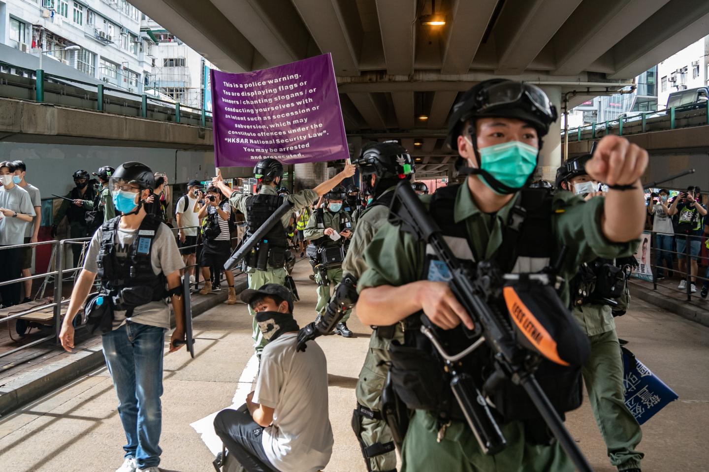 Hong Kong wakes up to confusion and arrests as National Security law goes into force
