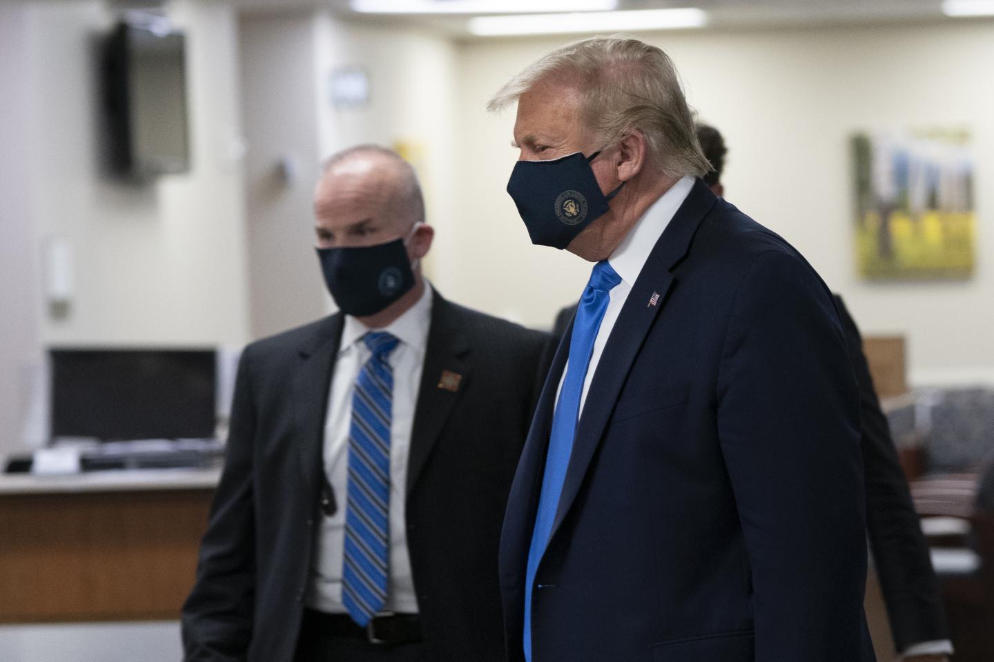 Trump wears a mask at Walter reed