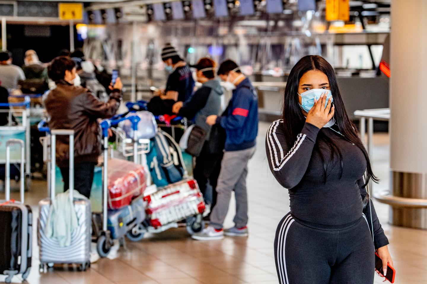 The case of the unmasked airline passenger contracting COVID adds fuel to a growing debate