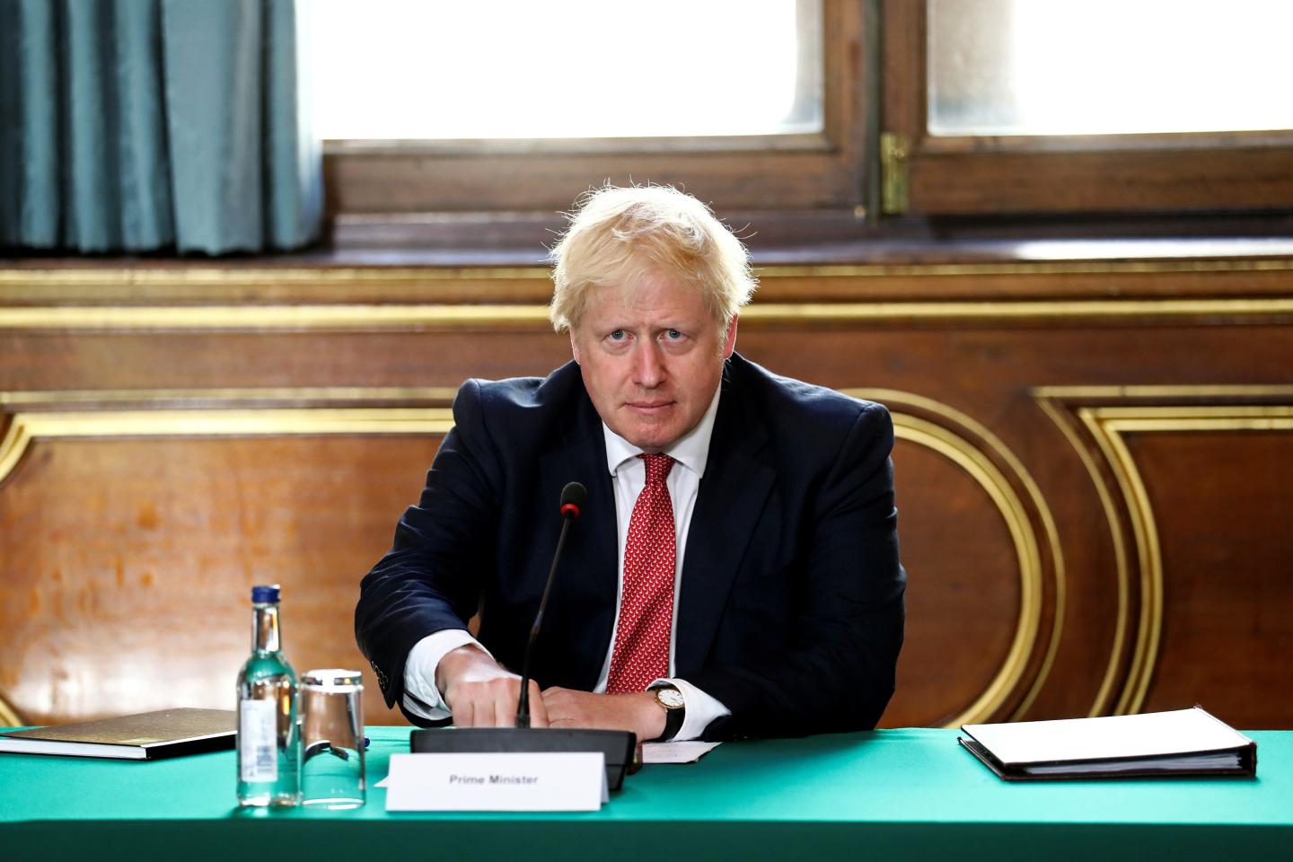 Prime Minister Boris Johnson chairs a face-to-face meeting of his cabinet team of ministers, the first since mid-March, on July 21, 2020 in London, England.