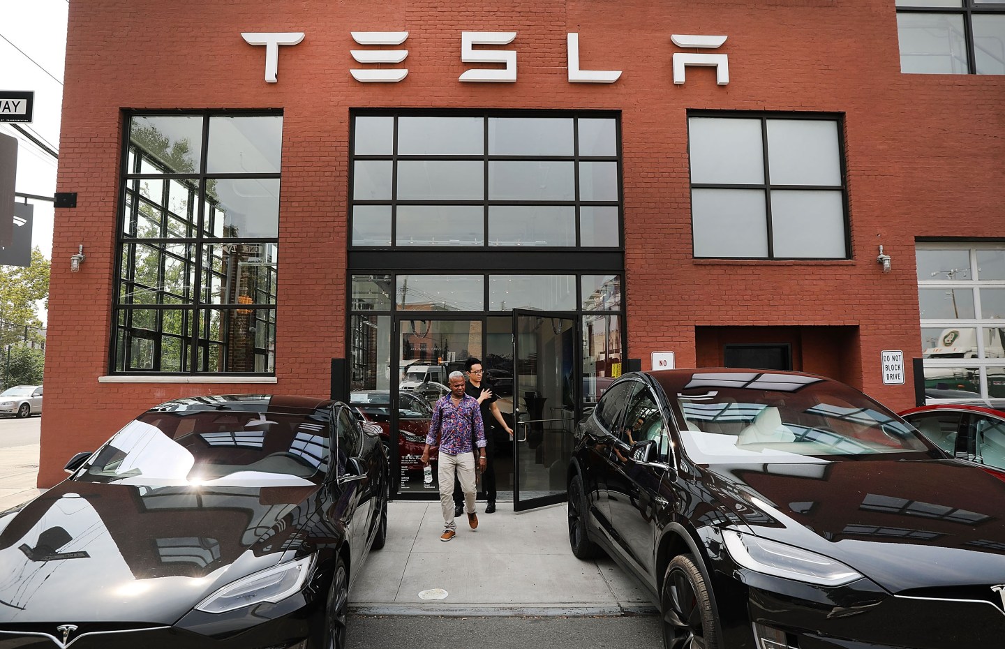 Tesla’s soaring stock sends its market value above $400 billion