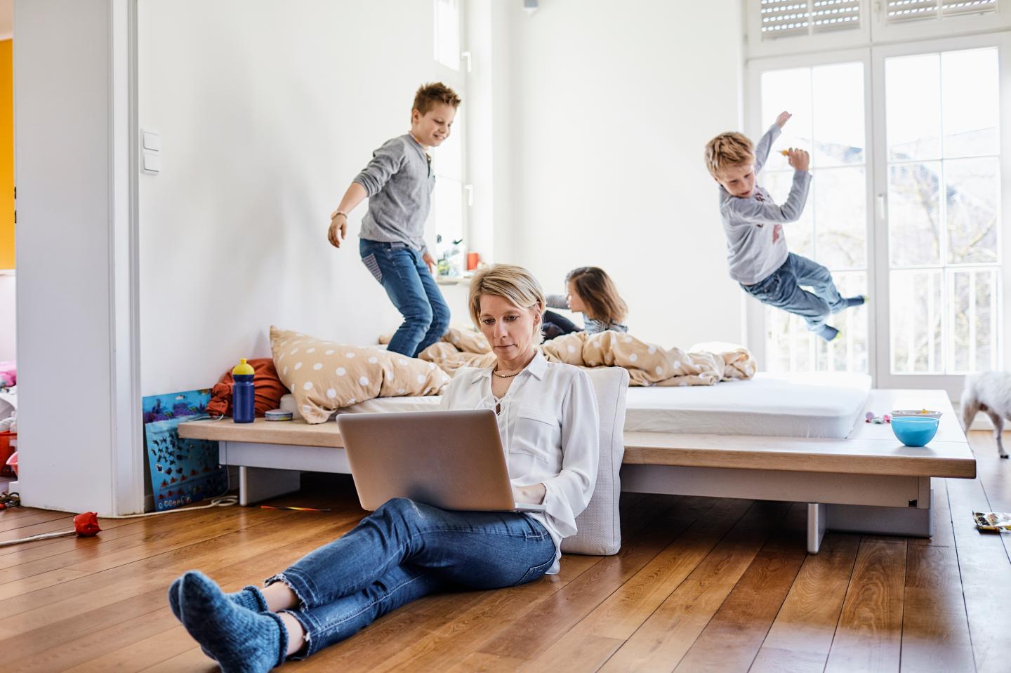 Moms are getting fewer raises and promotions than dads while working remotely