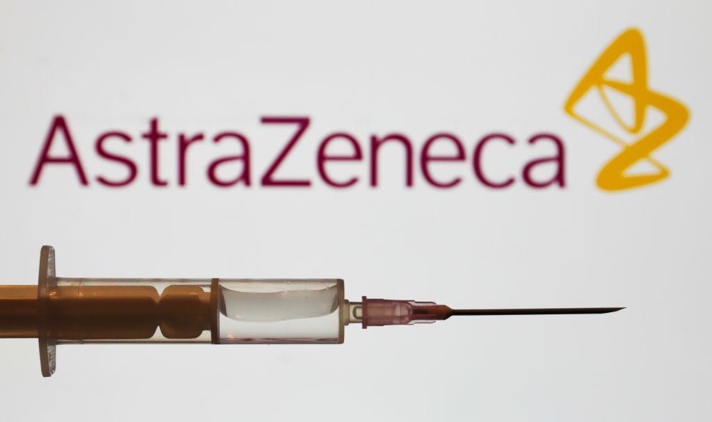 Syringe shown against the AstraZeneca logo