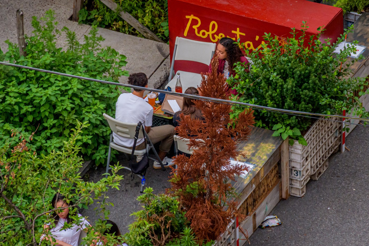 People eating at Roberta's Pizza