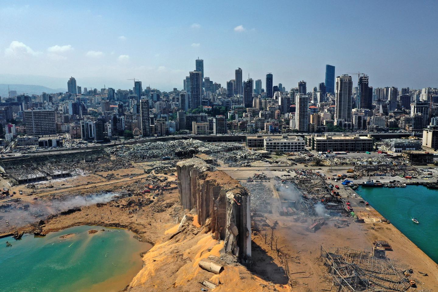 An aerial view shows the massive damage done to Beirut port's grain silos and the area around it on August 5, 2020, one day after a mega-blast tore through the harbour in the heart of the Lebanese capital with the force of an earthquake, killing more than 100 people and injuring over 4,000.
