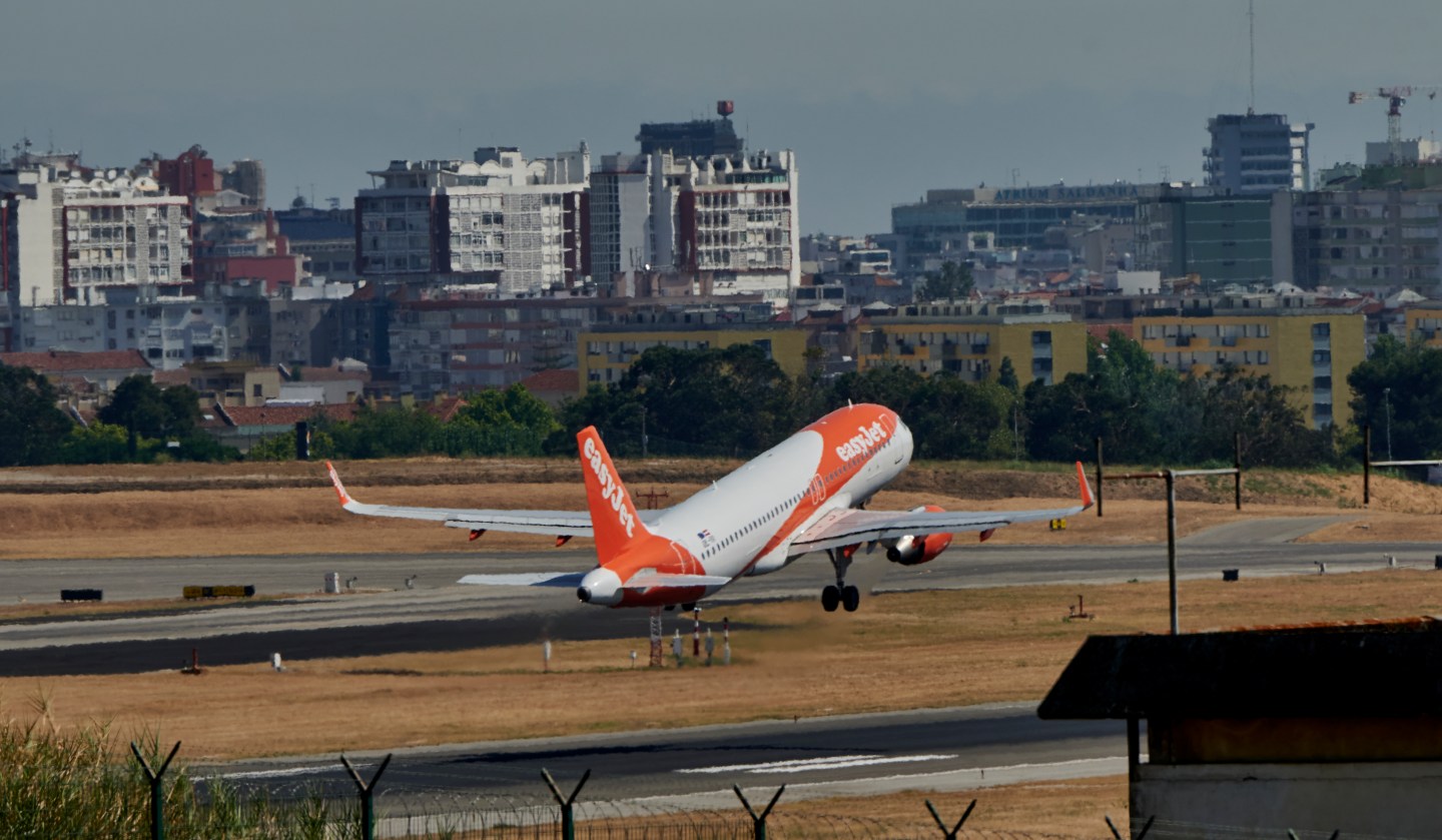 EasyJet Airbus A320-214(WL) takes off in Humberto Delgado International Airport on a hot afternoon during the COVID-19 Coronavirus pandemic, on July 22, 2020 in Lisbon, Portugal.
