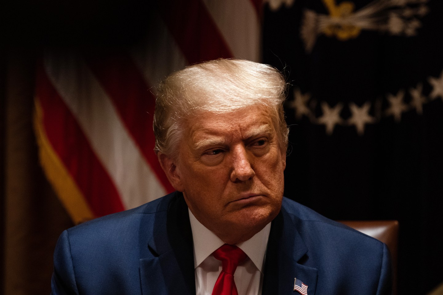 U.S. President Donald Trump listens during a meeting with members of the National Association of Police Organizations Leadership in the Cabinet Room of the White House July 31, 2020 in Washington, DC.