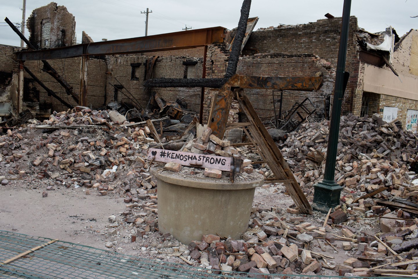 A section of the Uptown neighborhood remains in ruins after last week's rioting, on September 1, 2020, in Kenosha, Wisconsin. President Trump came to tour sections of the town burned down from rioting over a police officer's shooting of local resident Jacob Blake, and to thank the police. (Photo by Andrew Lichtenstein/Corbis via Getty Images)