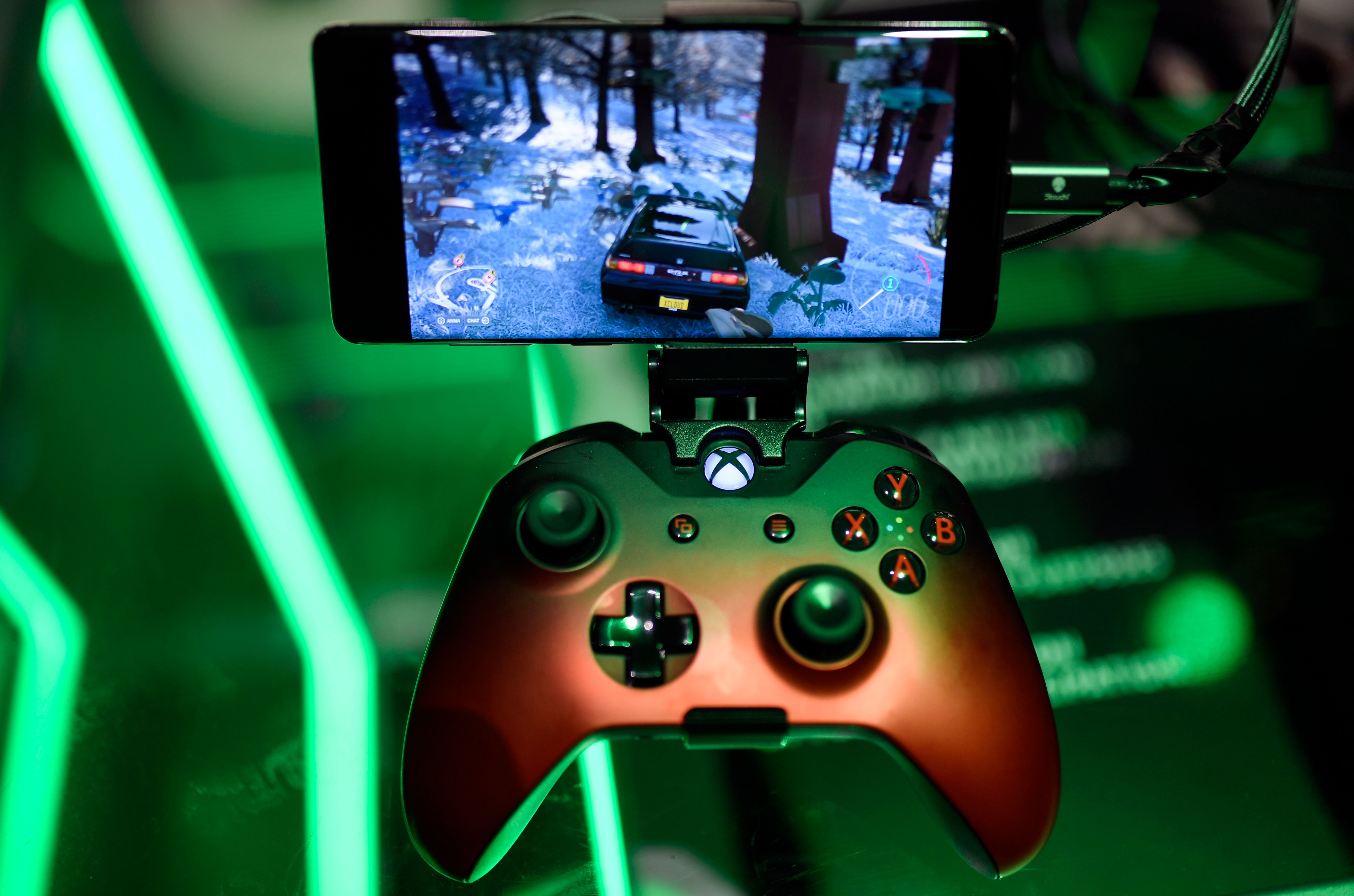 A cloud-based console is displayed at the Microsoft Xbox stand during the Video games trade fair Gamescom in Cologne, western Germany, on August 21, 2019. (Photo by Ina FASSBENDER / AFP)        