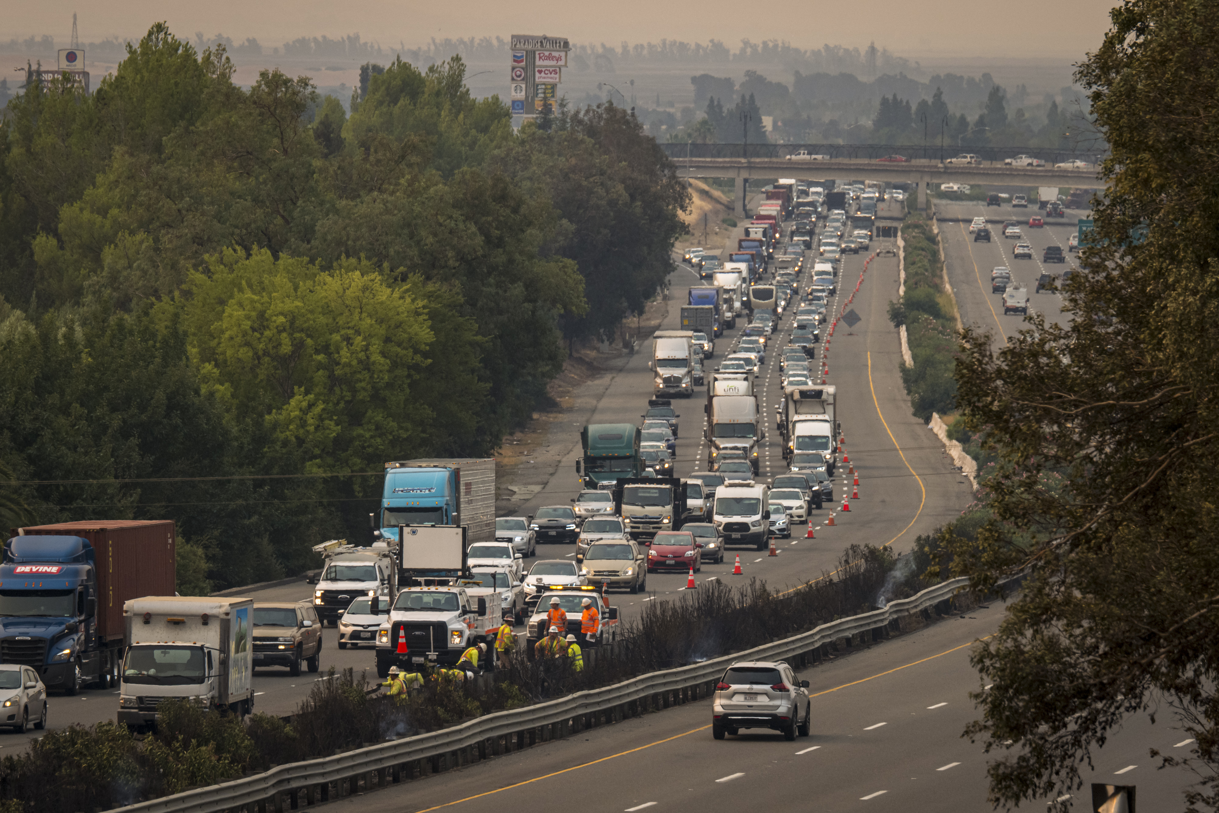 Traffic on eastbound Interstate 80 in Fairfield, California, U.S., on Thursday, Aug. 20, 2020. More than 360 blazes are burning in California, forcing mass evacuations in the northern part of the state and creating an air quality emergency. 