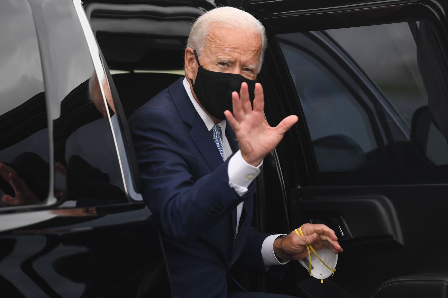 Democratic presidential nominee former US Vice President Joe Biden arrives to board an airplane at New Castle Airport in New Castle, Delaware, August 31, 2020, as he travels to Pennsylvania for campaign events.