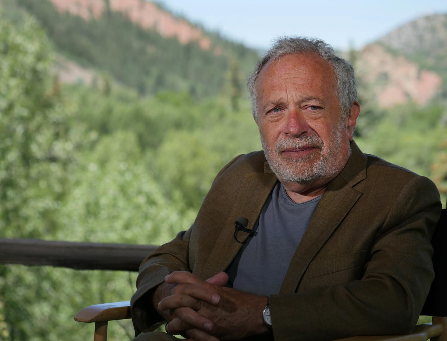 Elon Musk trades insults with Robert Reich over Tesla pay cuts
