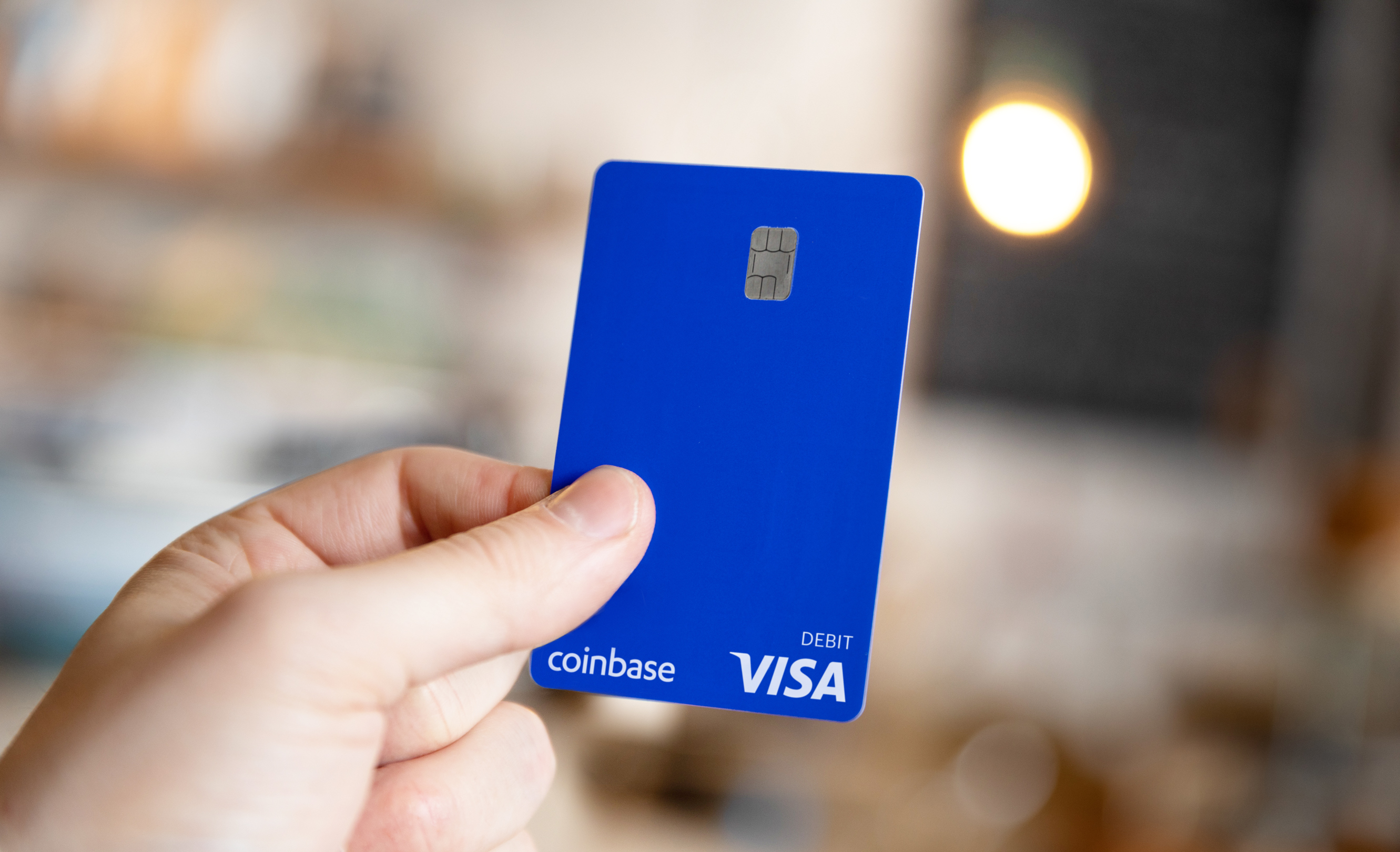 Coinbase launches crypto debit card in U.S. with 1% Bitcoin reward | Fortune