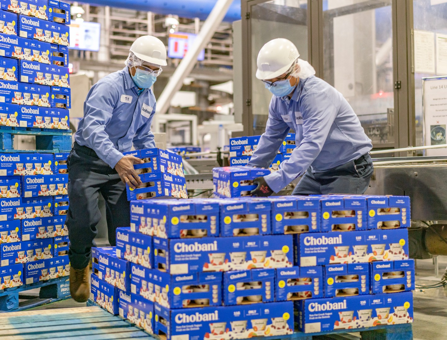 Chobani employees at the company's plant in South Edmeston, N.Y. plant. The yogurt marker is increasing its starting wage to at least $15 per hour.