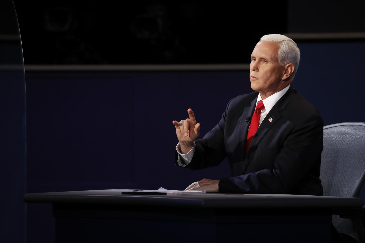 Mike Pence, head of the coronavirus task force, struggles to answer questions during debate