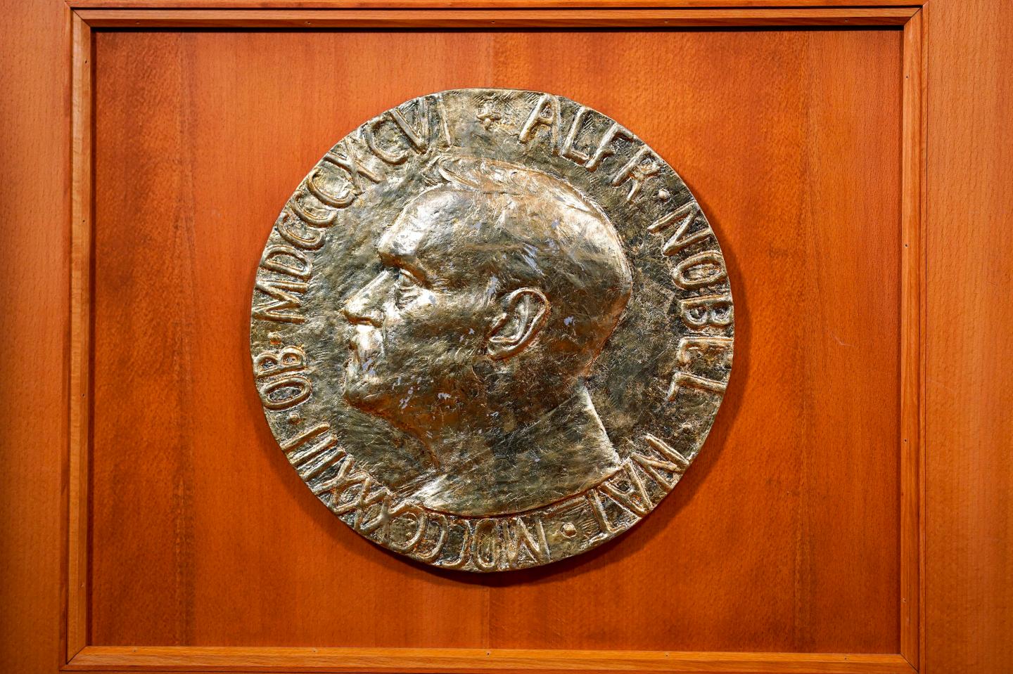 The portrait of Alfred Nobel is seen at the desk prior to the announcement of the laureates of the 2020 Nobel Peace Prize in the Nobel Institute in Oslo on October 9, 2020.
