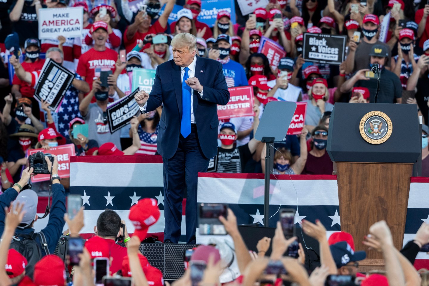 President Donald Trump dances on stage after a campaign rally on October 18, 2020 in Carson City, Nevada.