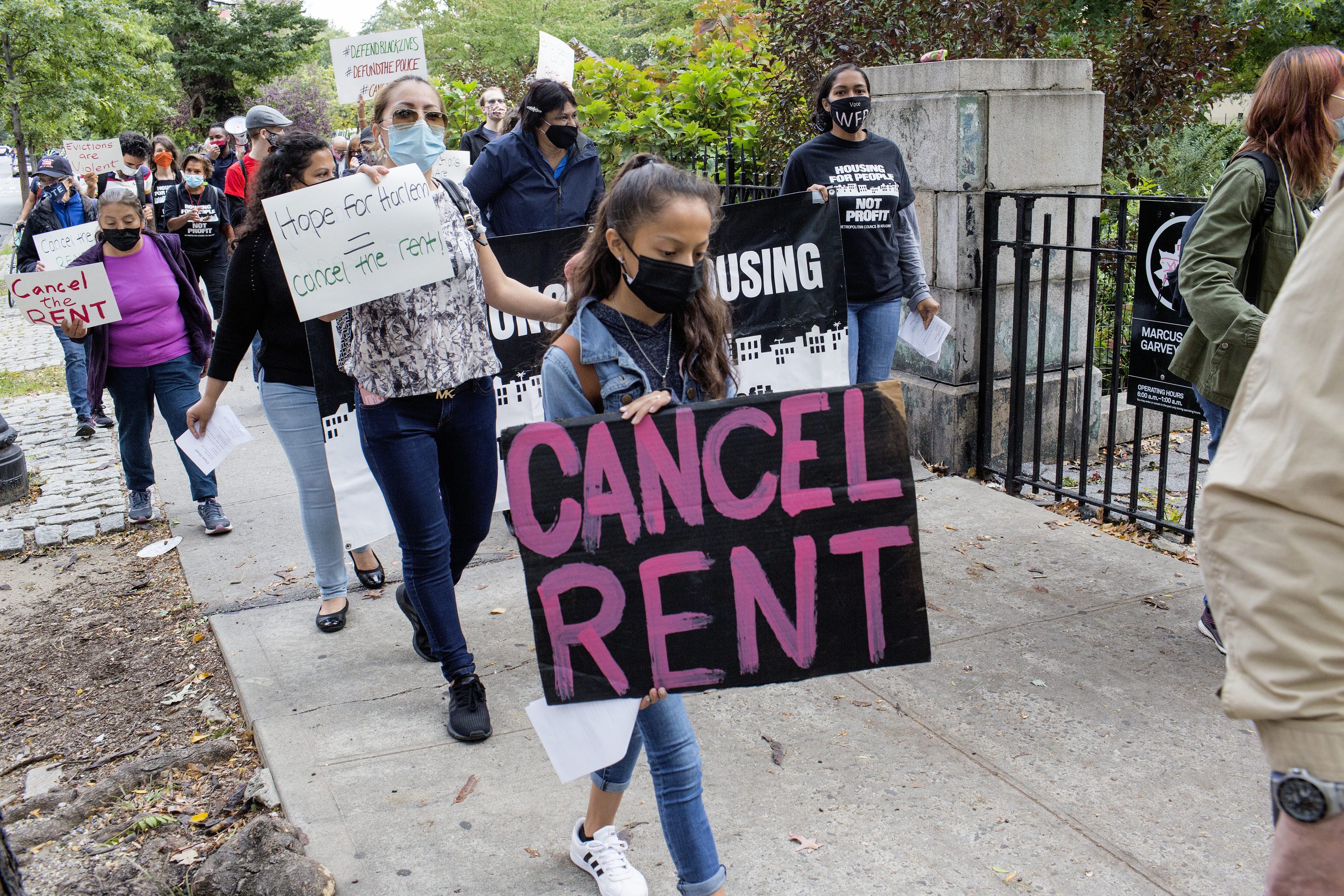 NEW YORK, NEW YORK - OCTOBER 10: Housing advocates and tenants march to demand that New York Governor Cuomo cancel rent as the unemployment crisis continues due to the COVID-19 pandemic on October 10, 2020 in Harlem, New York. The group marched to State Senator Brian Benjamin's home to call for him to support the Cancel Rent bill in the legislature. (Photo by Andrew Lichtenstein/Corbis via Getty Images)