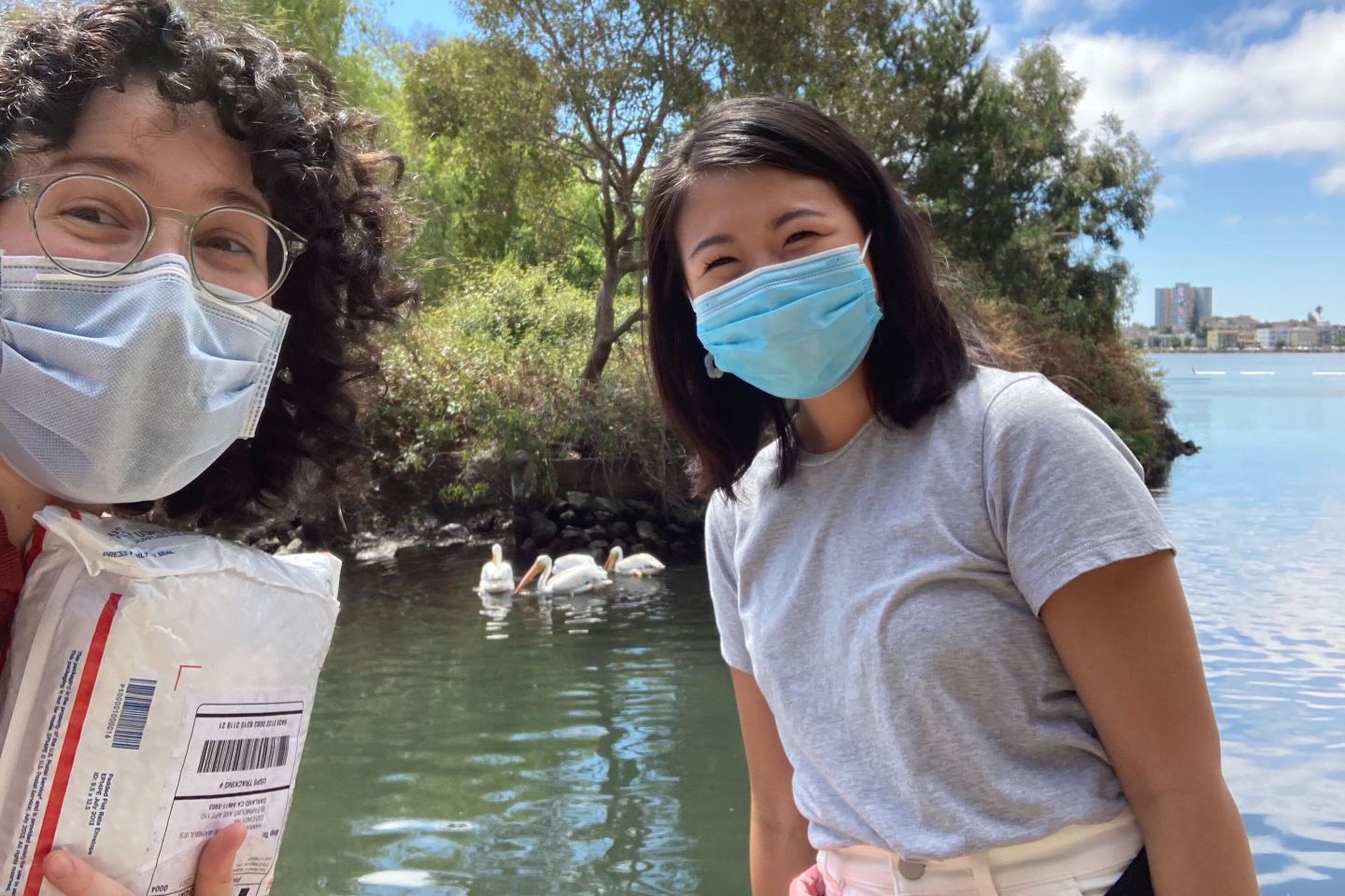 A YNAB employee hand-delivers a welcome package to their new coworker.