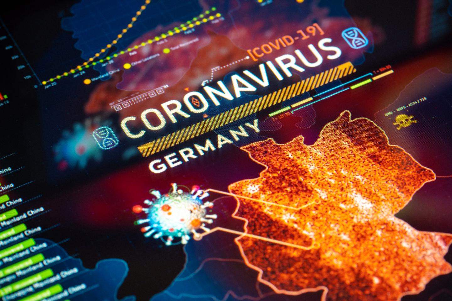 Coronavirus (COVID-19) Outbreak in Germany Statistics close-up on digital display.