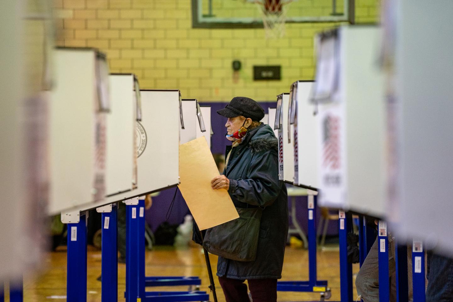 A person casts their ballot at Hunter-Bellevue School of Nursing polling station on November 1, 2020 in New York City.