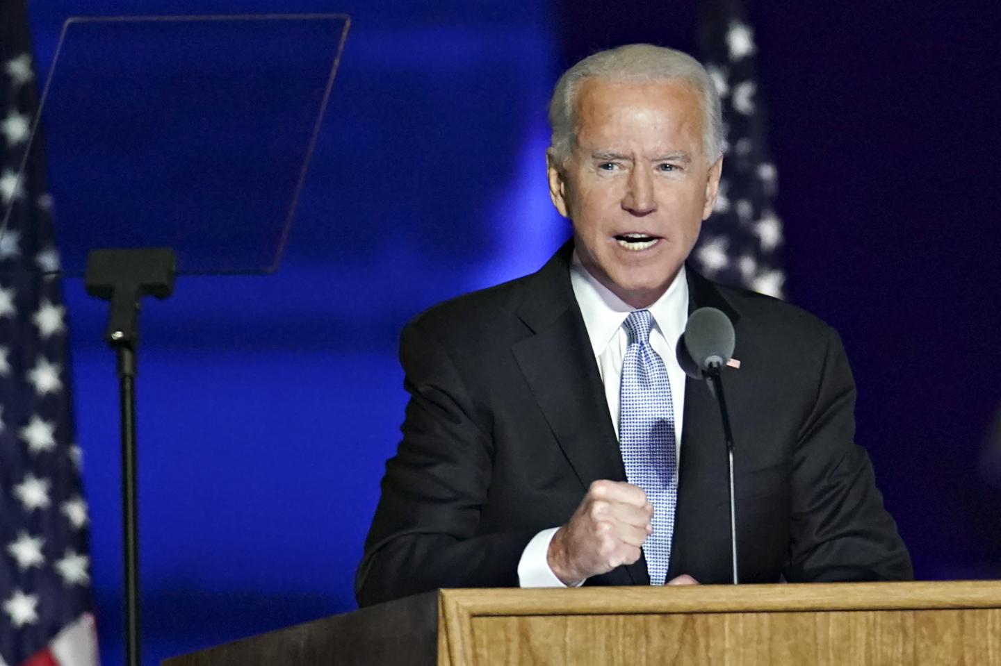 U.S. President-elect Joe Biden speaks while delivering an address to the nation during an election event in Wilmington, Delaware, U.S., on Saturday, Nov. 7, 2020.