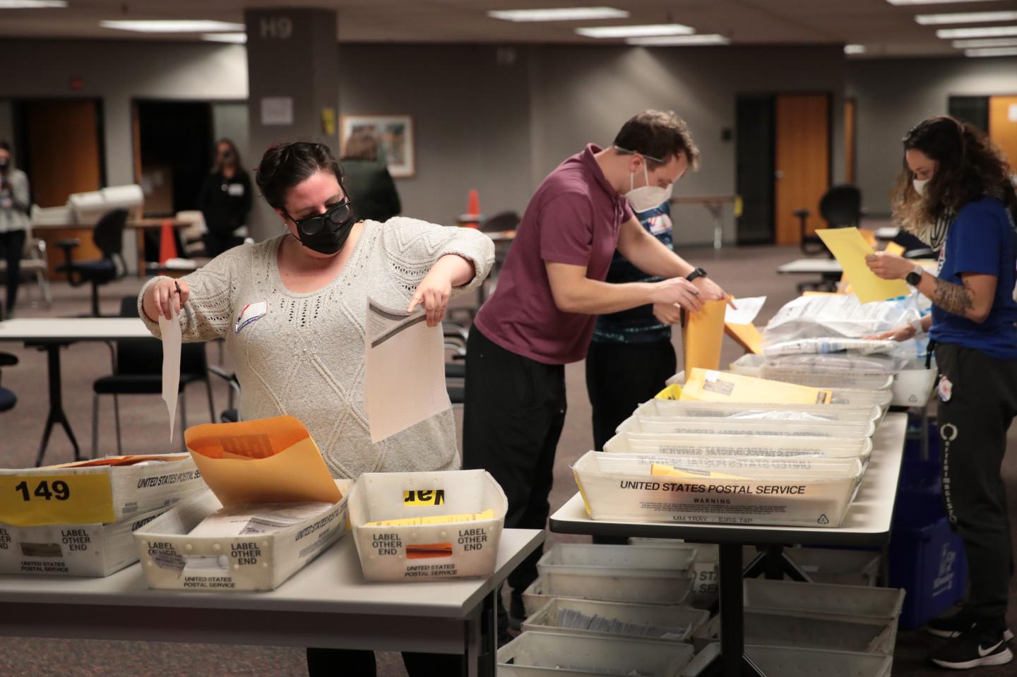 Election officials count absentee ballots on November 04, 2020 in Milwaukee, Wisconsin. Wisconsin requires election officials to wait to begin counting absentee ballots until after polls open on election day. The Milwaukee count was finished about 3AM.