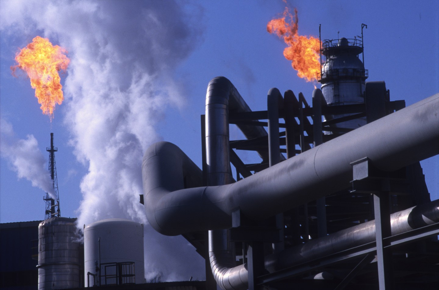 Oil slips from its eight-month high as OPEC+ tensions rise