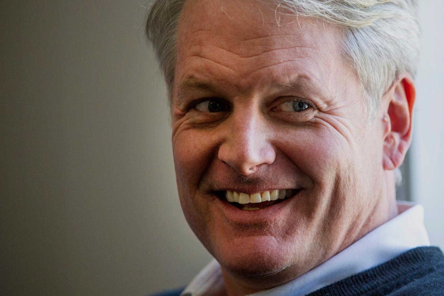 John Donahoe, then president and chief executive officer of eBay Inc., smiles during an interview in San Francisco, California, U.S., on Thursday, April 10, 2014.