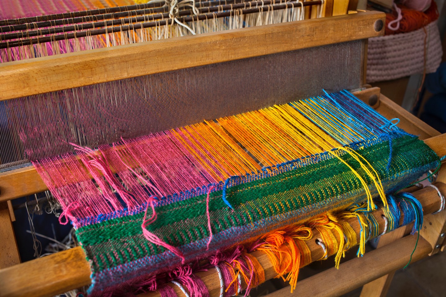 Textile loom for weaving