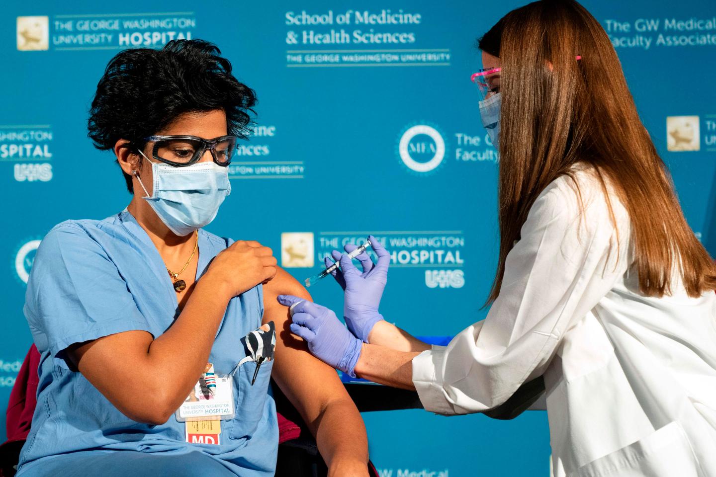 How hospitals are prioritizing who to give COVID vaccines to first