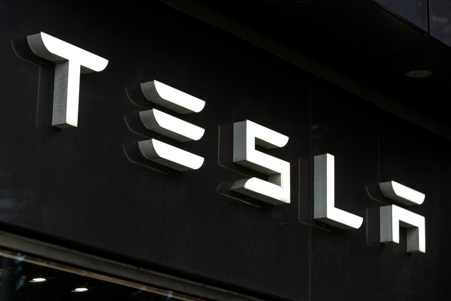 Tesla slides on first day of trading on S&P 500 Index