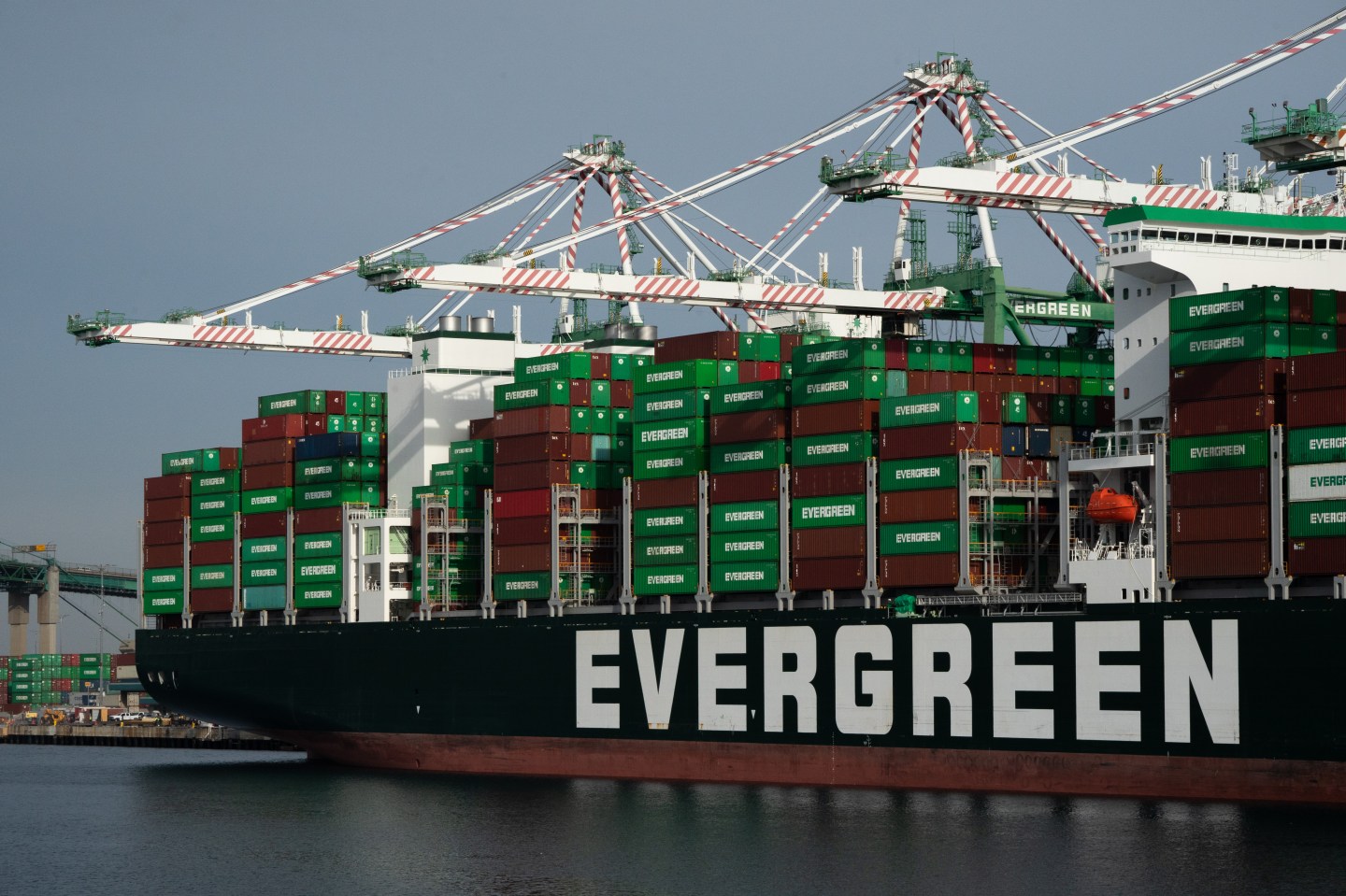 Containers stacked on a cargo ship at the Port of Los Angeles. Under President Trump, the author writes, “international trade faced multiple shocks in the form of increased protectionism and attacks on the World Trade Organization’s dispute resolution body.”