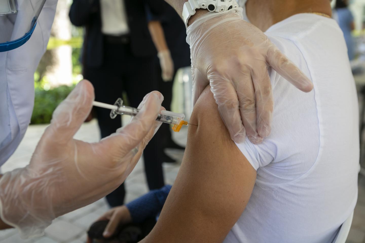 Only 2.1 million Americans have received their first dose of the COVID vaccine