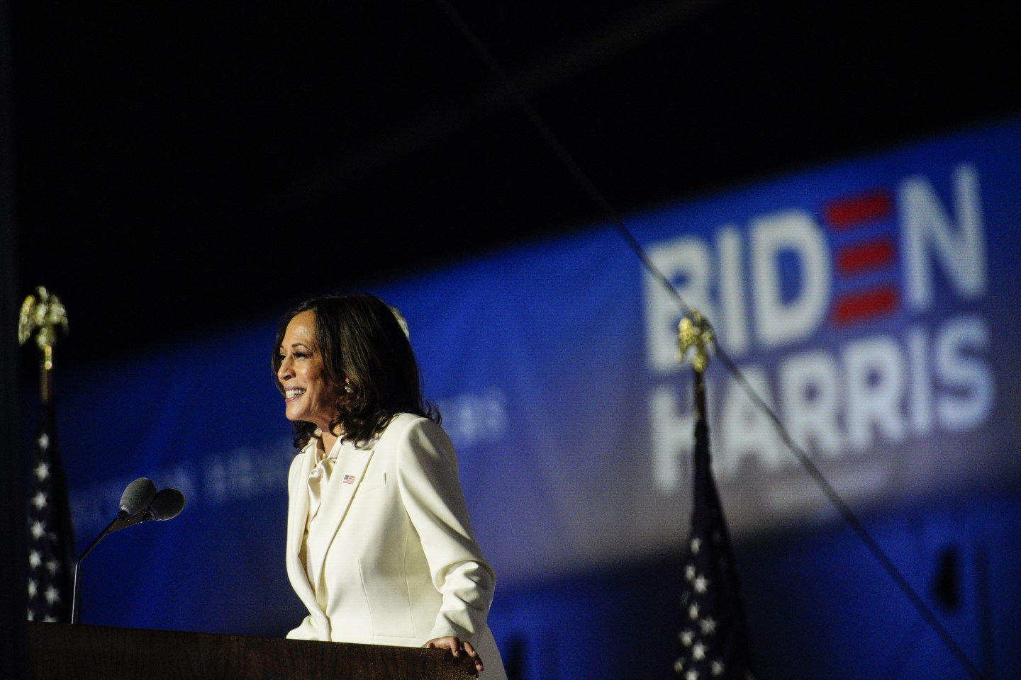 U.S. Vice President-elect Kamala Harris smiles while delivering an address to the nation during an election event in Wilmington, Delaware on Nov. 7, 2020.