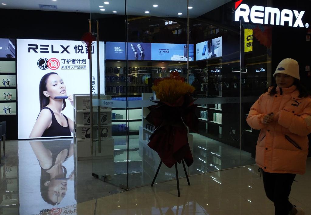 After a blockbuster IPO, China’s top vape-maker faces a regulatory conundrum: Is it tobacco or tech?
