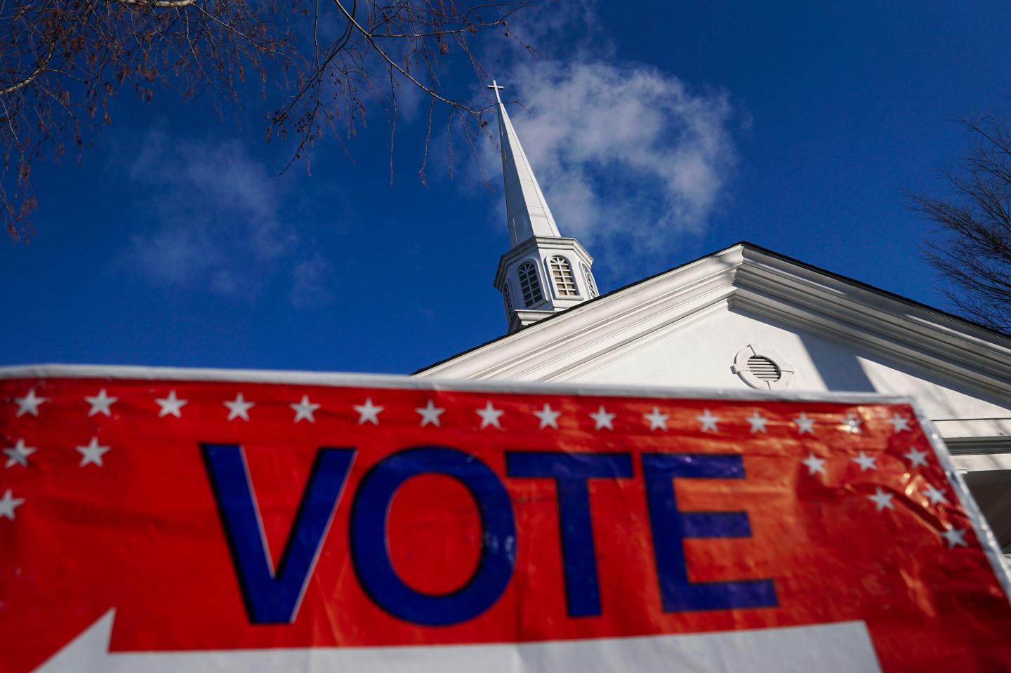 Tech futures and the dollar sink as the Georgia vote points to victories for the Democrats
