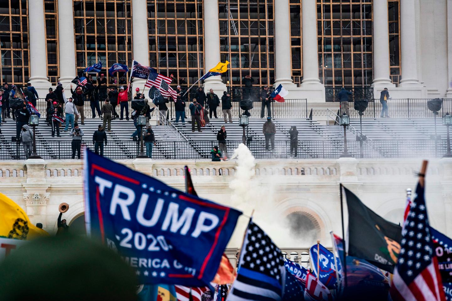 Supporters of US President Donald Trump clash with the US Capitol police during a riot at the US Capitol on January 6, 2021, in Washington, DC.