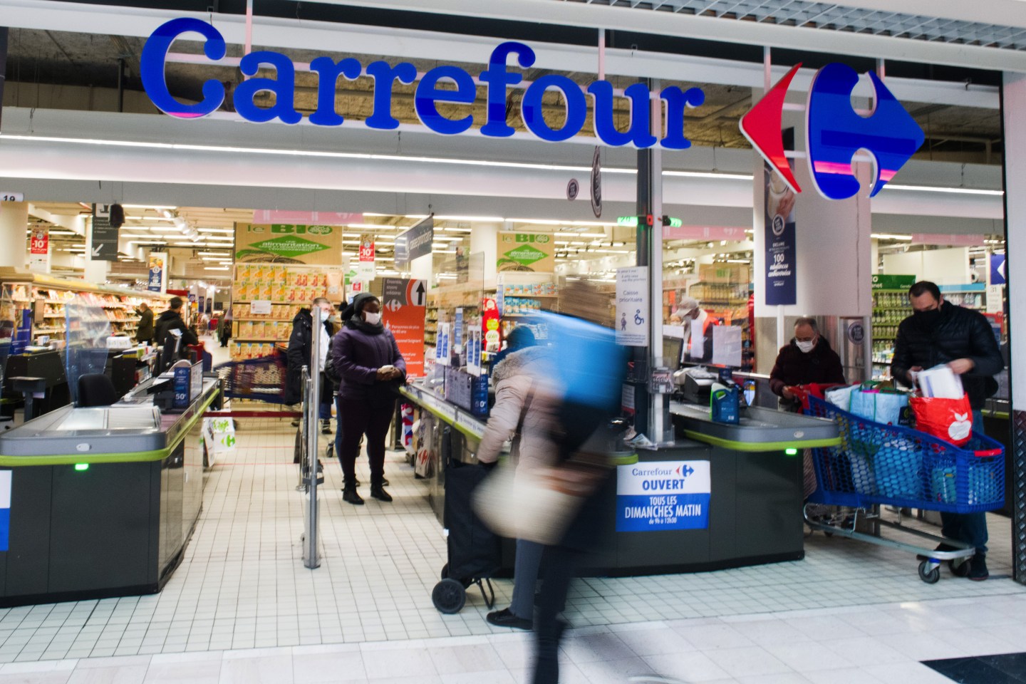 Carrefour shares pop as merger talks intensify