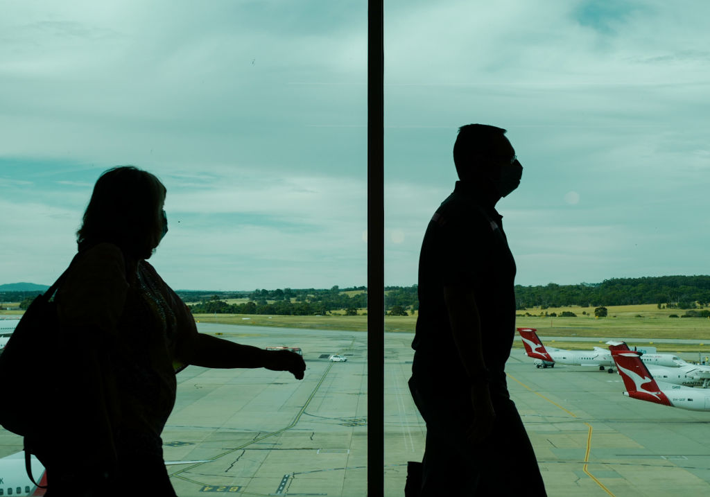 Passengers wear face masks at Melbourne Airport domestic terminal